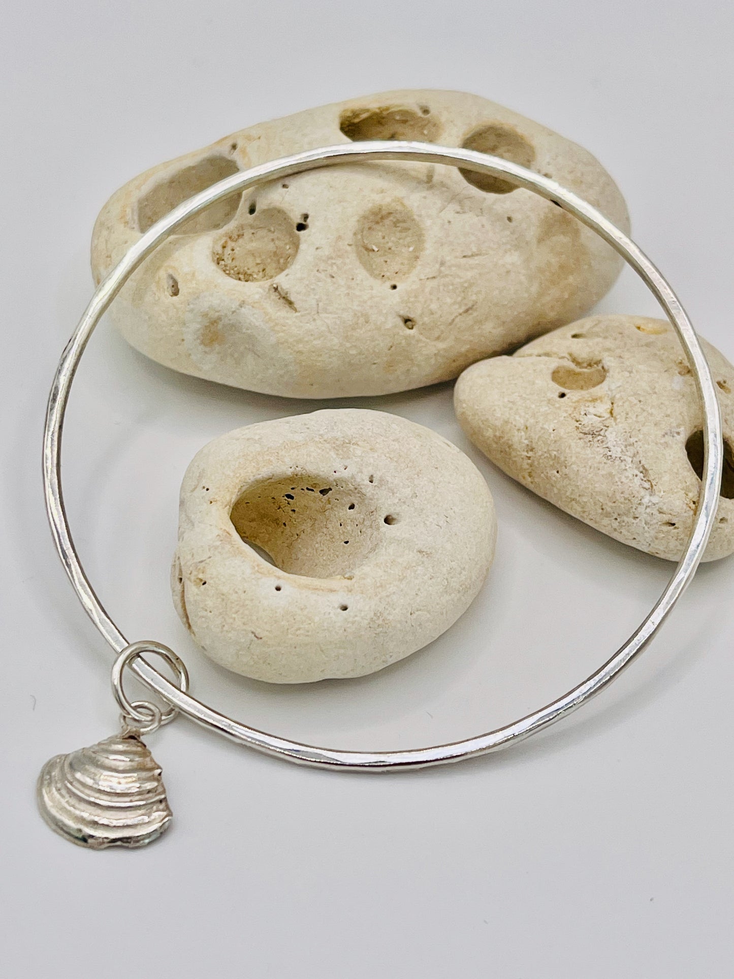 A Fine silver bracelet with shell.