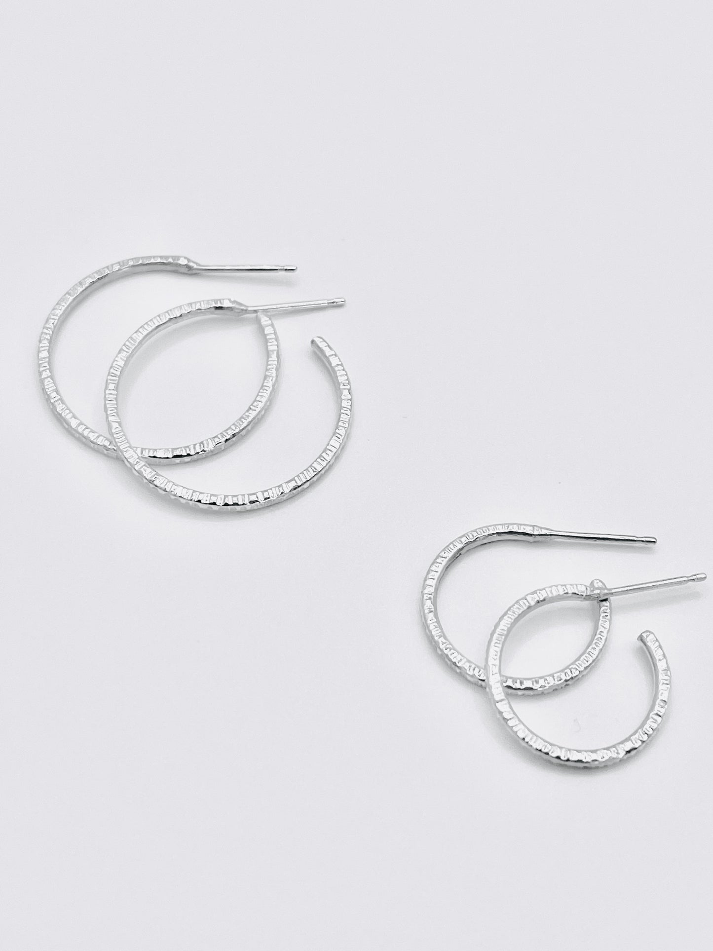 Silver ridged hoop earings