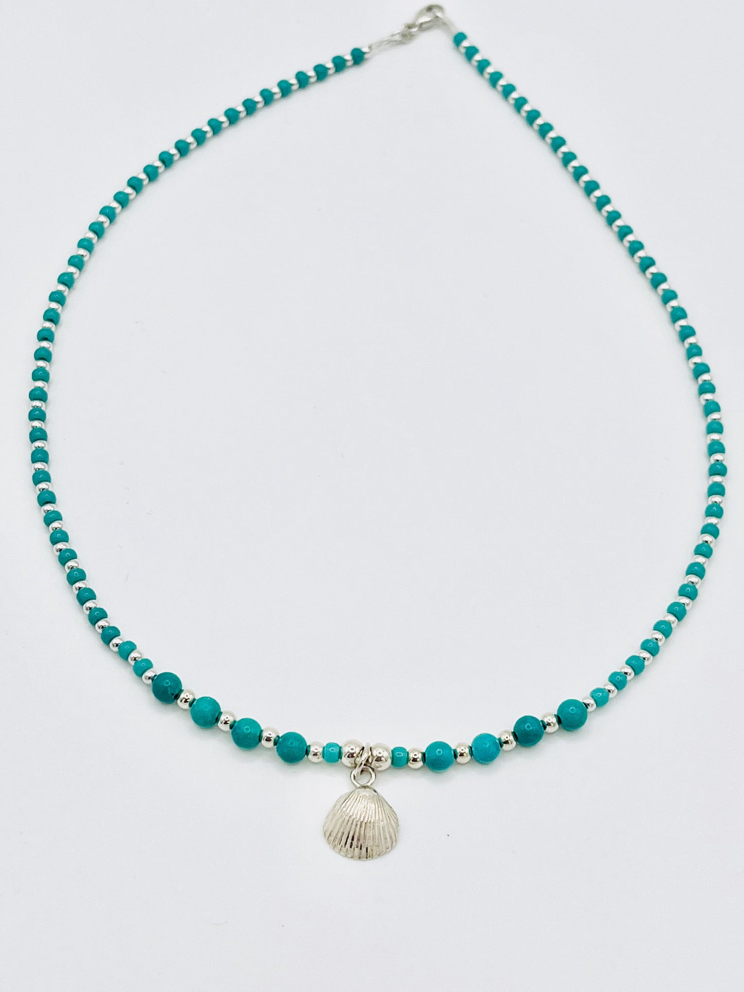 Scallop necklace.