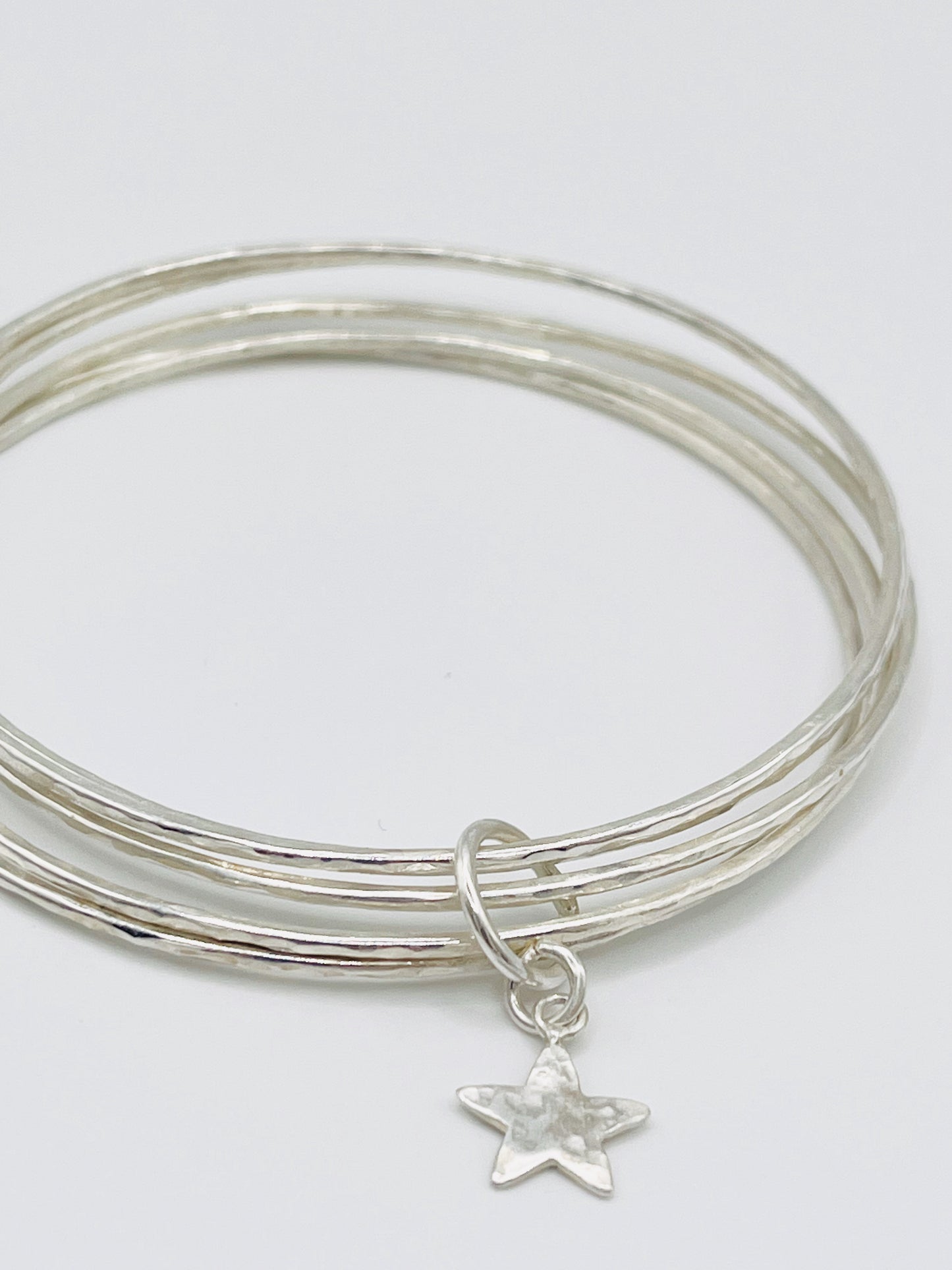 Silver star stacking bracelet.