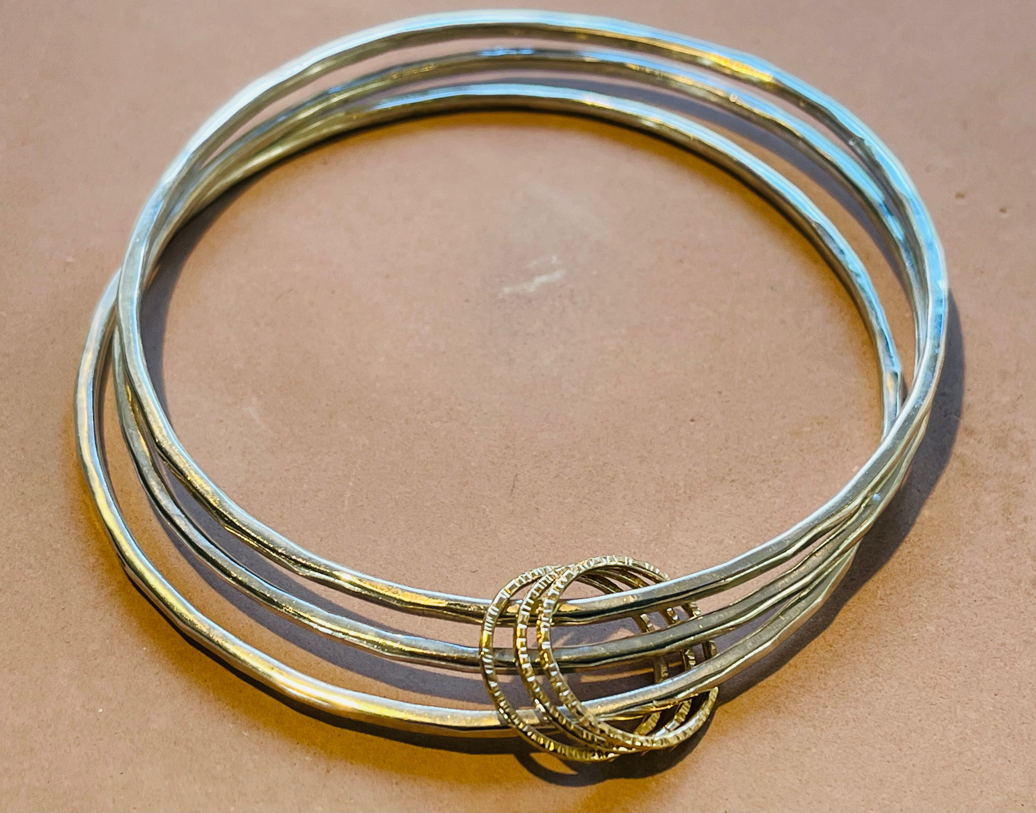 Triple Gold rings Bangle.