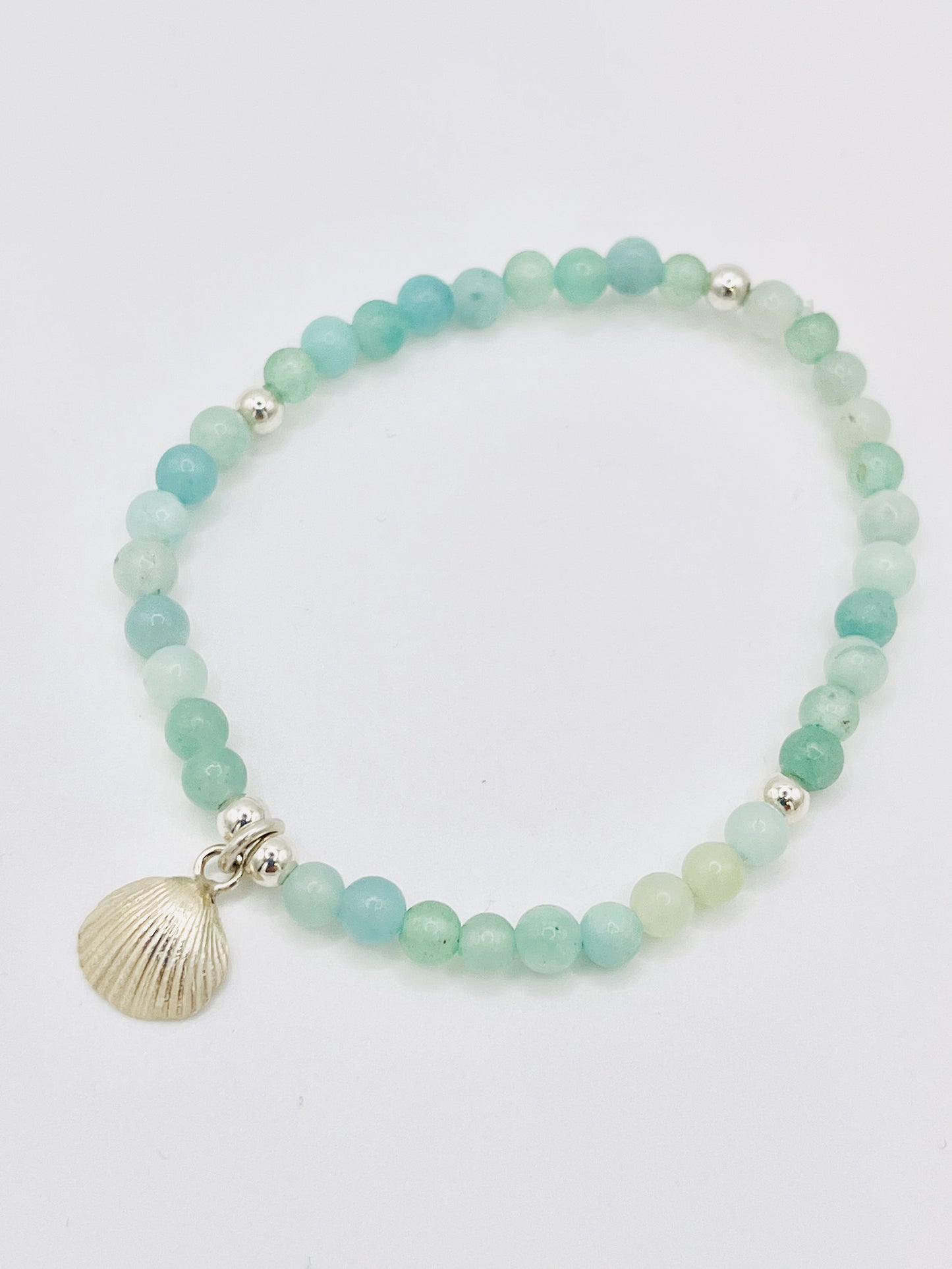 Aqua blue scallop shell bracelet.