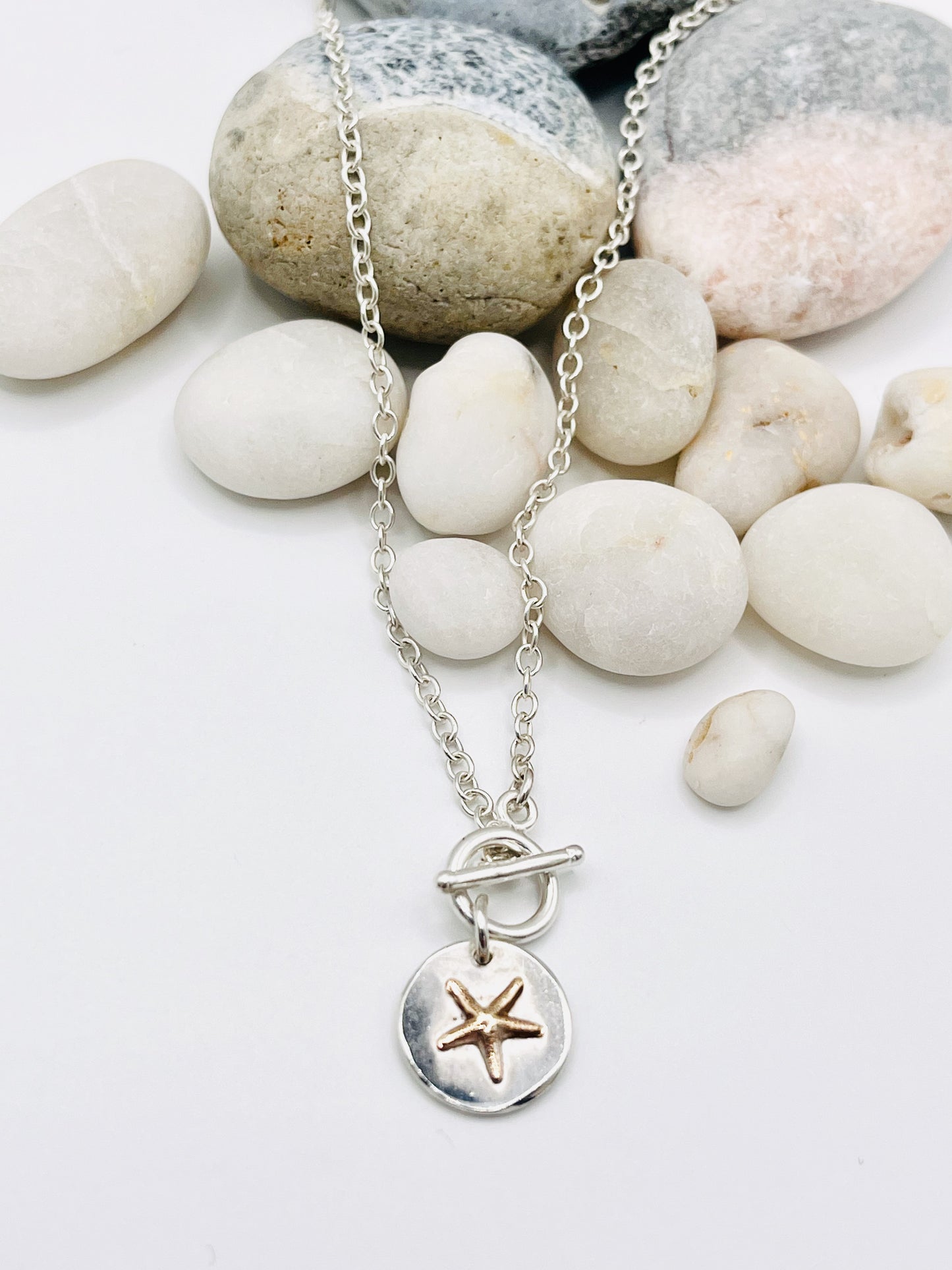 Gold starfish chain necklace.