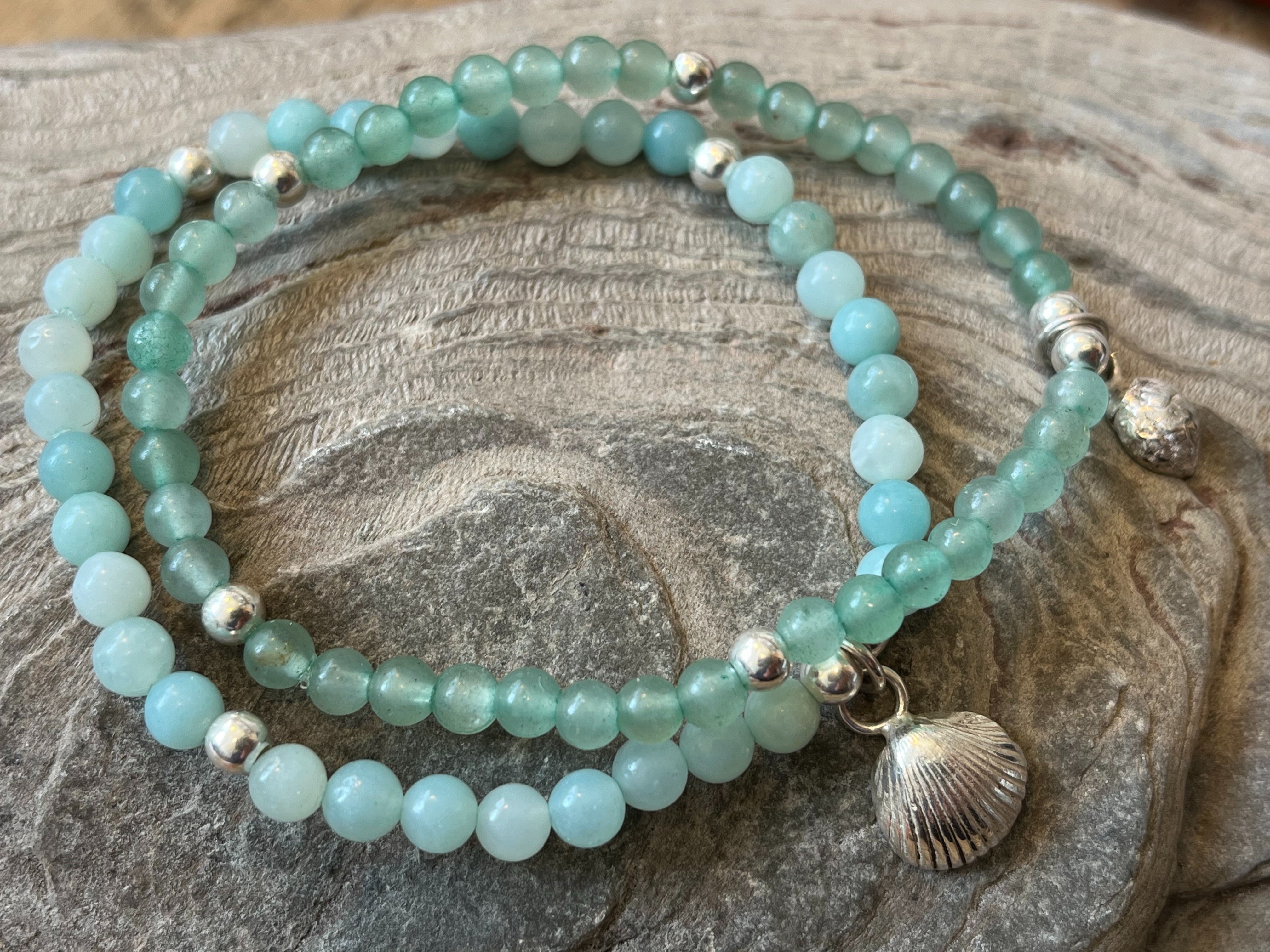 Pale blue beaded shell bracelet.