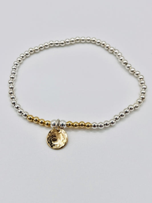 Gold shimmer beaded bracelet.