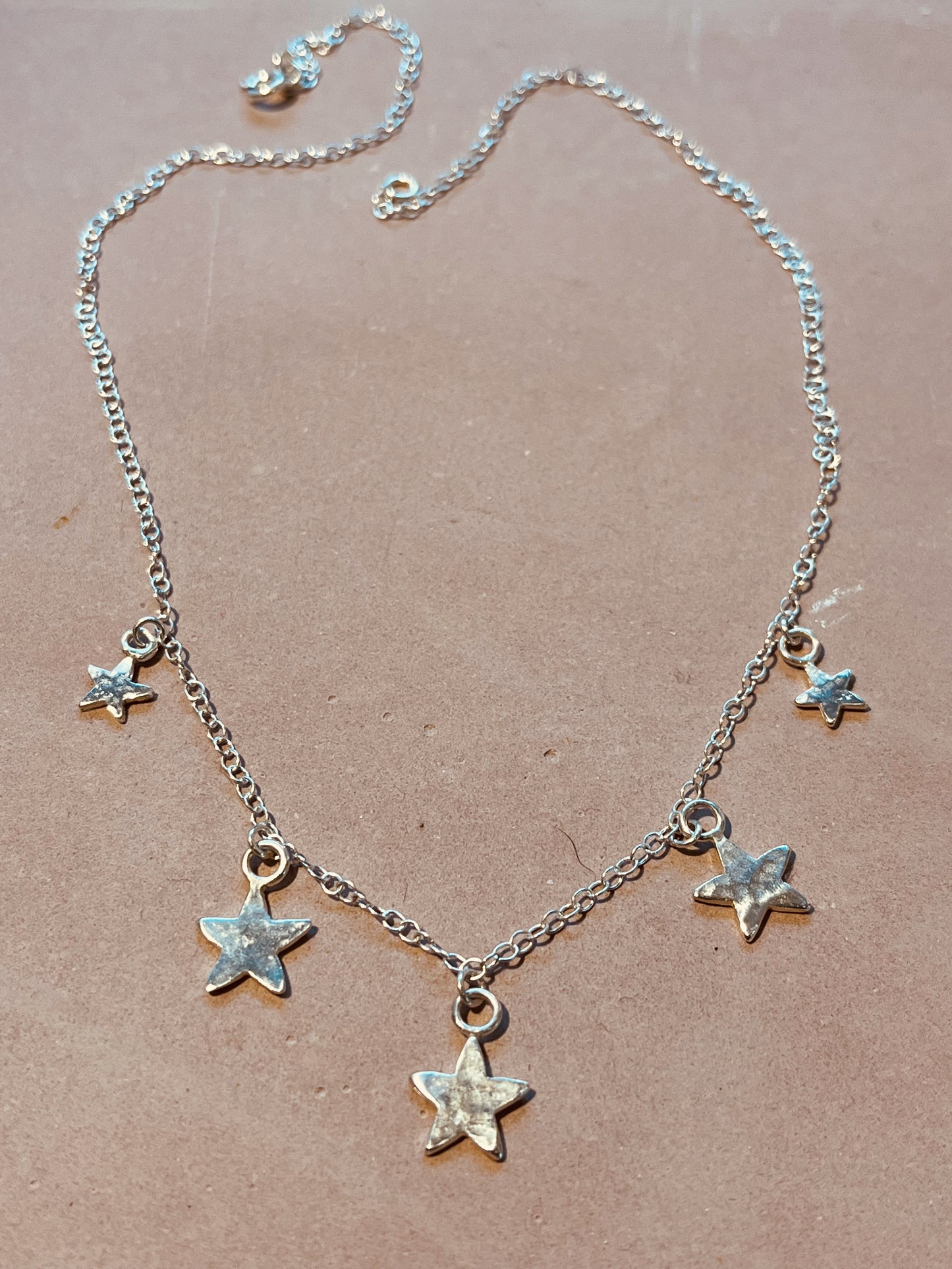 Silver Star necklace.