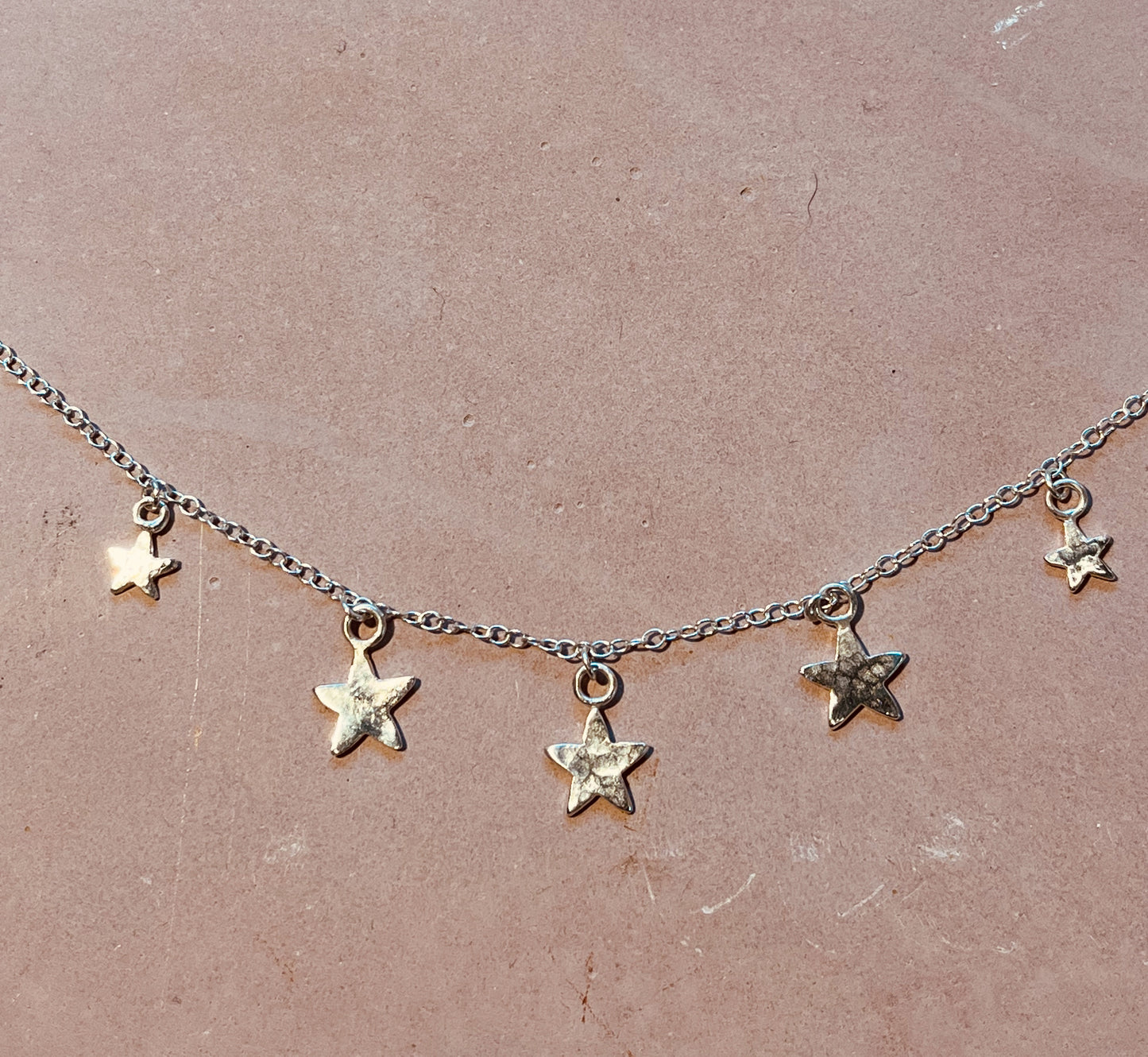 Silver Star necklace.