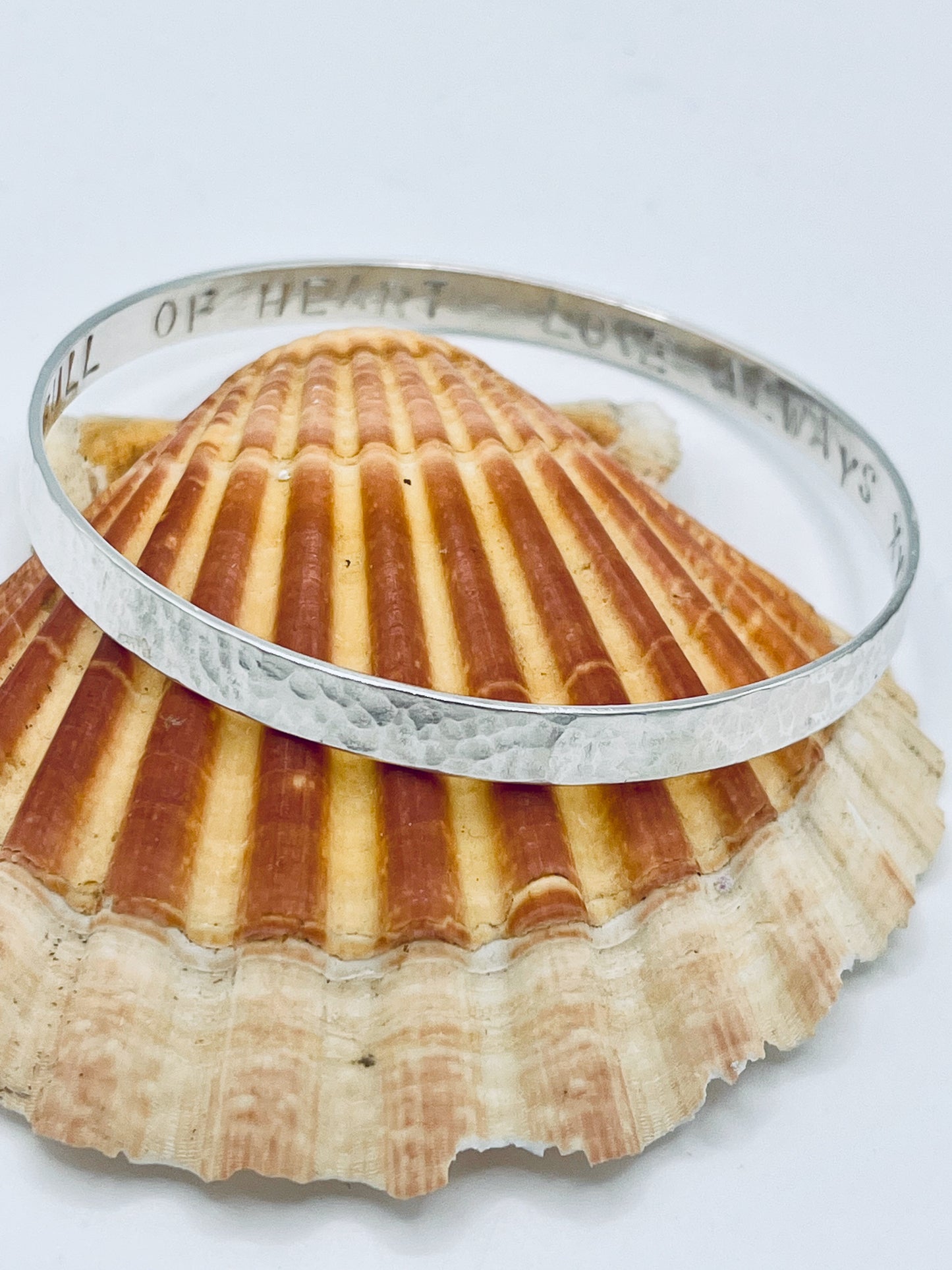 Silver Flat textured bangle with personalised inside.
