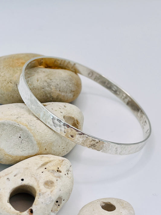 Silver Flat textured bangle with personalised inside.