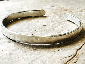 Silver cuff bracelet.