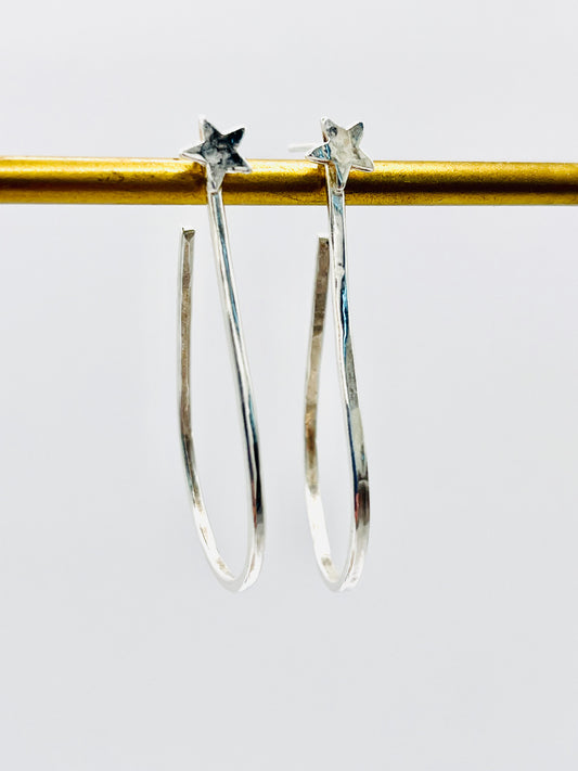 Silver star hoops.