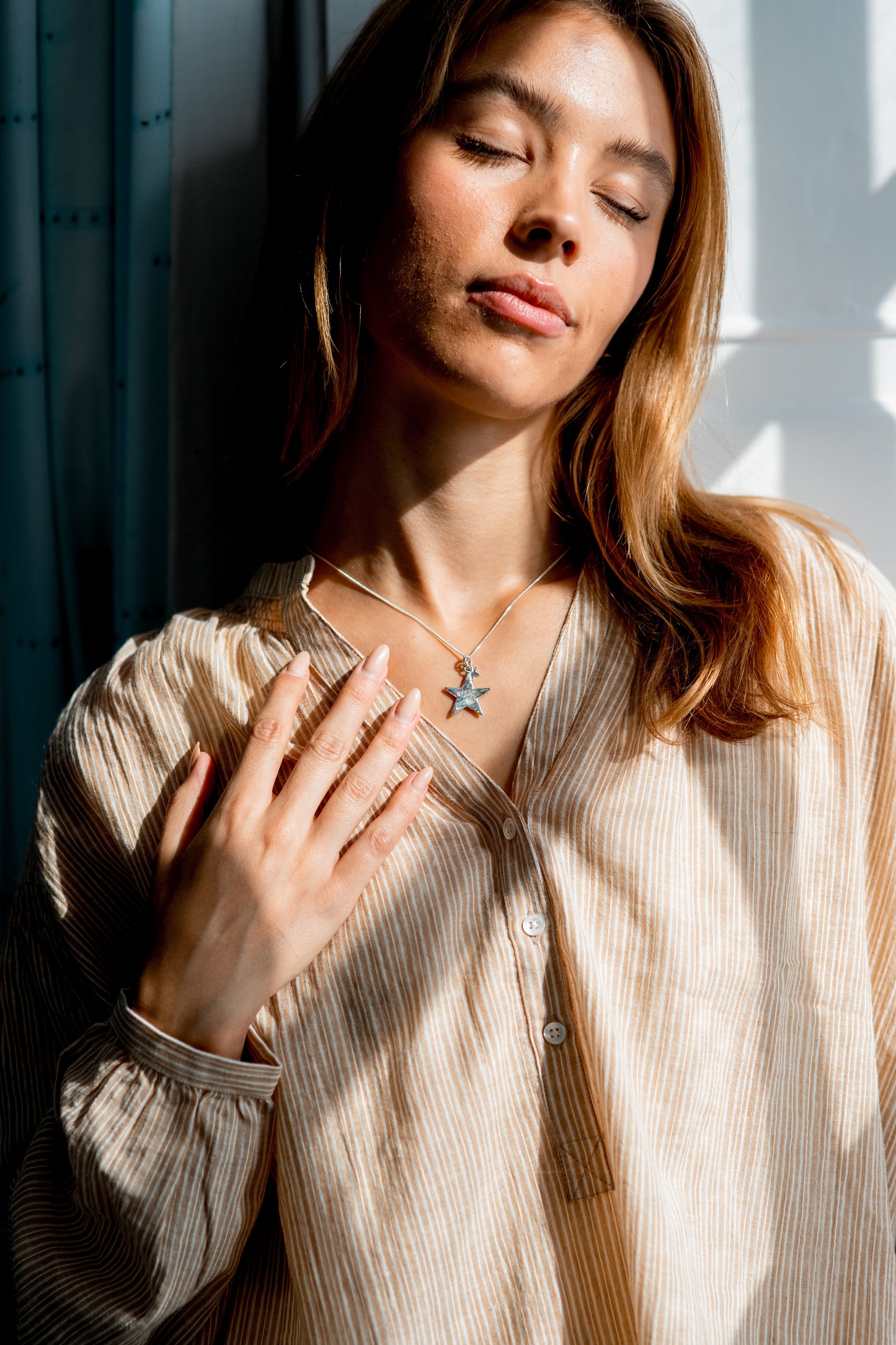 Silver Star necklace.