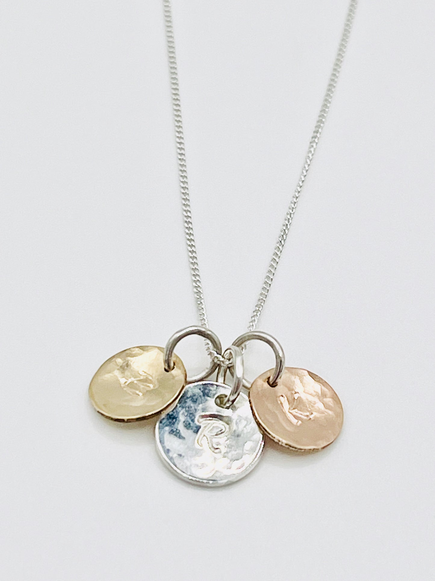 Trio of discs necklace.