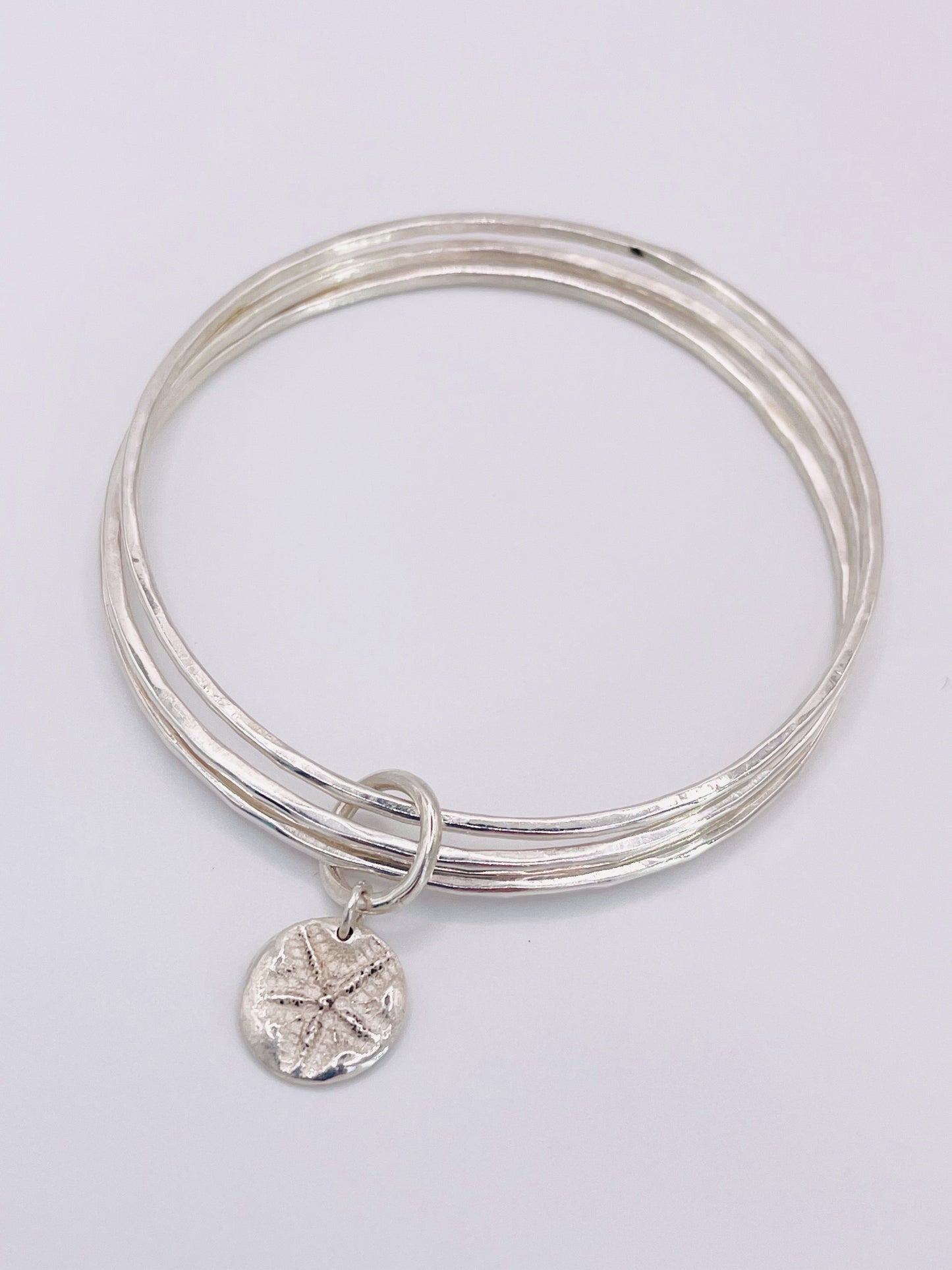 Triple starfish bangle.