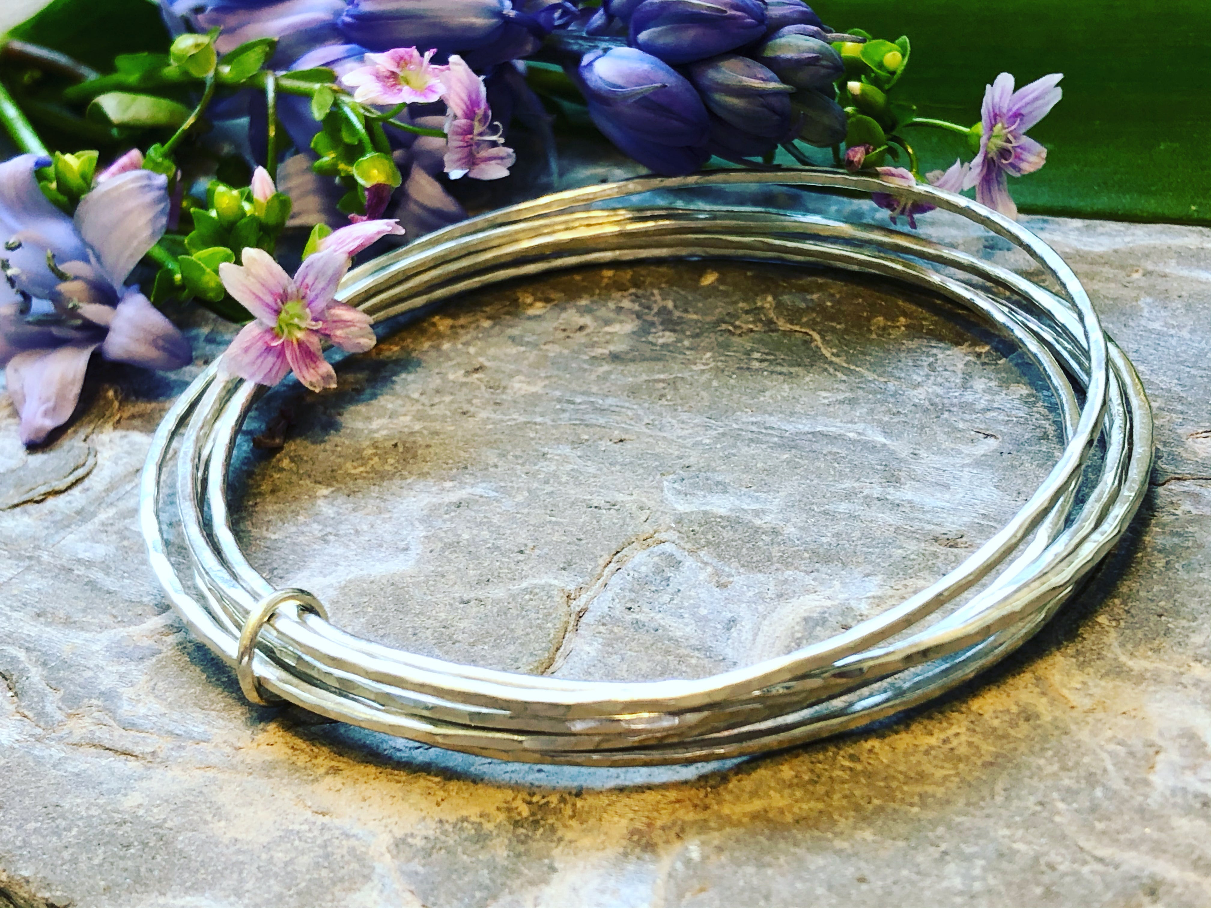 Silver stacking bracelet.