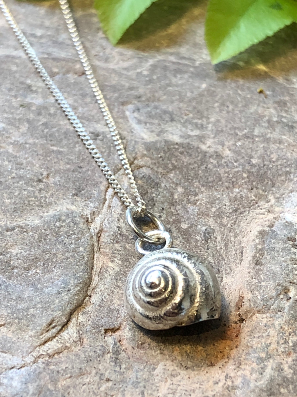 Spiral shell necklace.