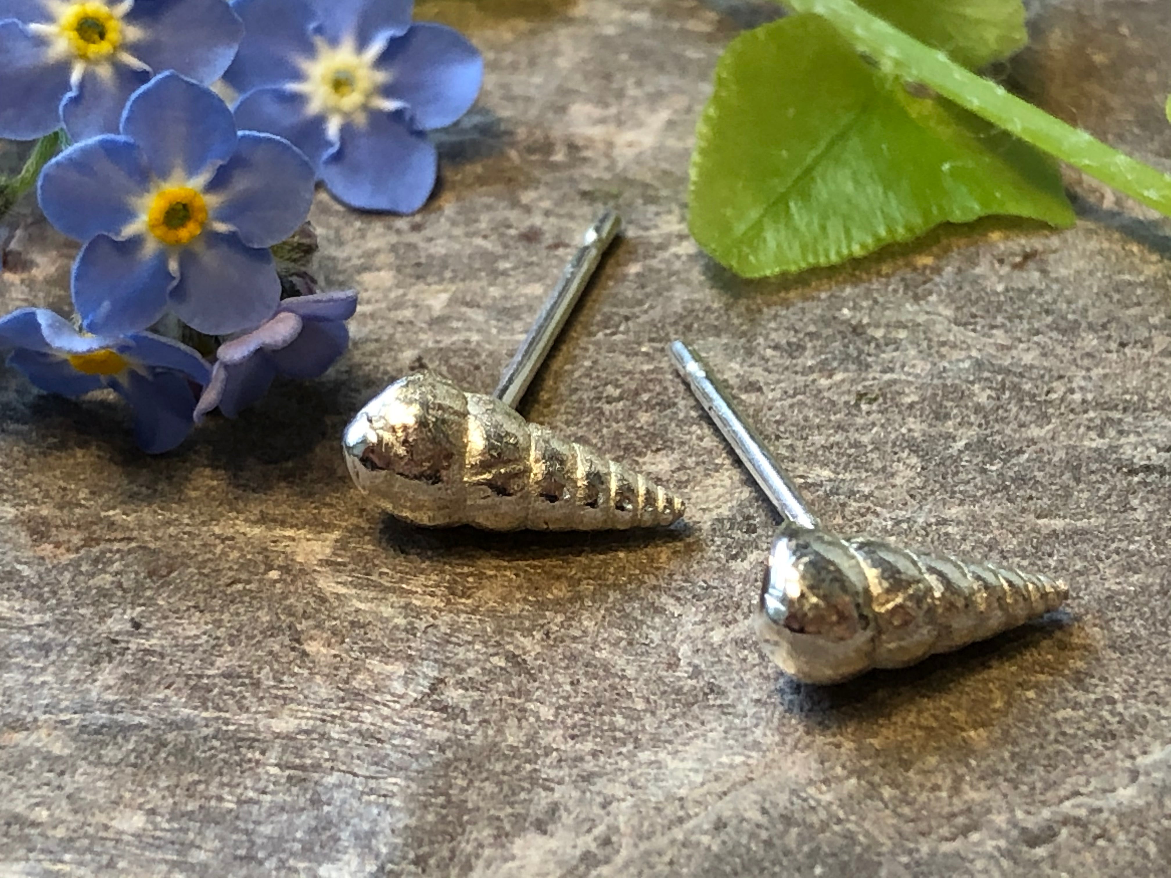 Twisted shell studs.