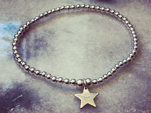 Silver beaded bracelet with personalised silver star.