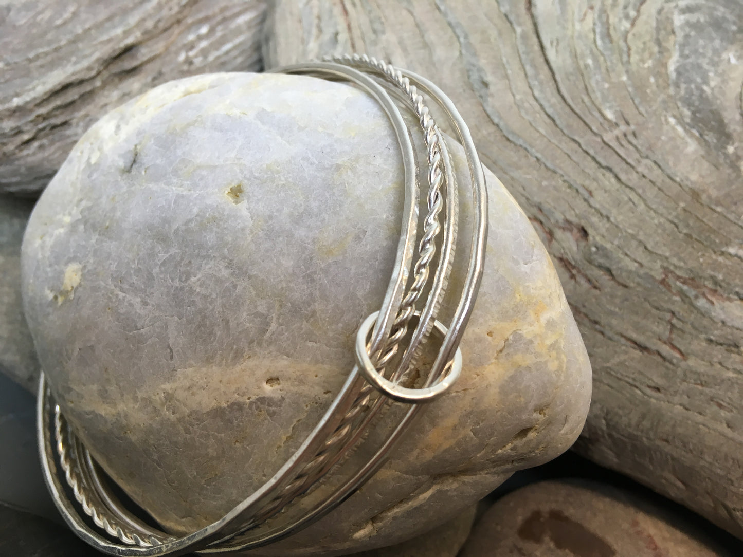 Multi textured bangle stack with personalised disc or heart.