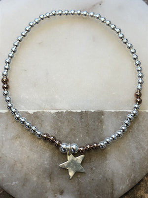 Silver beaded bracelet with personalised silver star.
