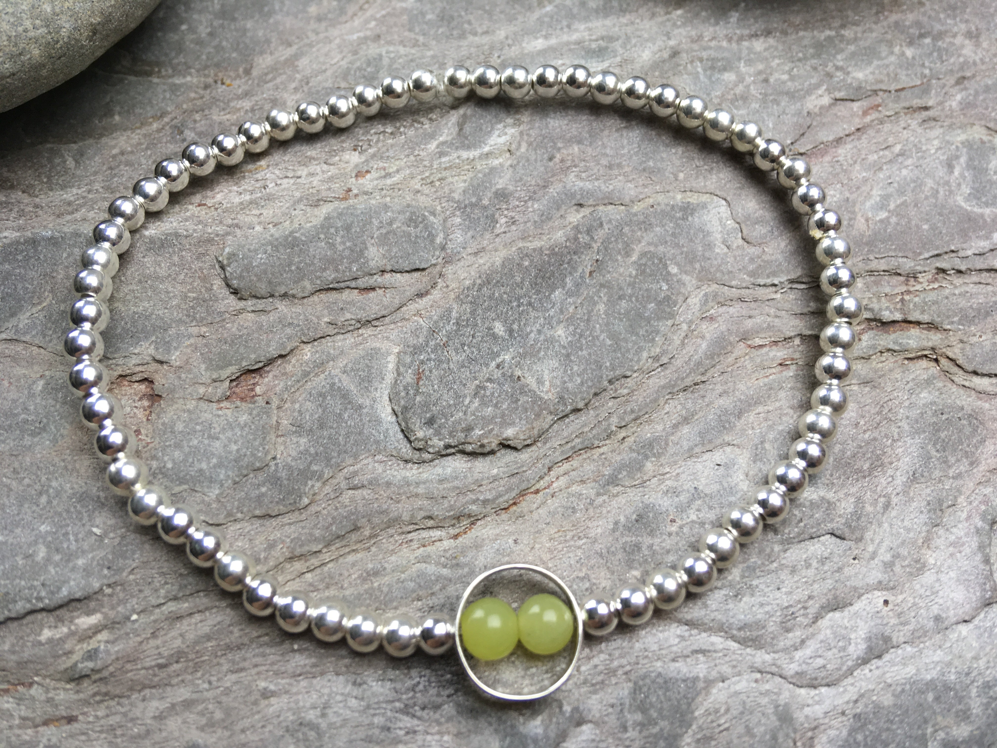 Silver beaded bracelet with double citrine stones.