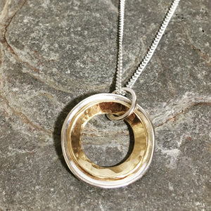 Silver and Gold domed rings necklace.