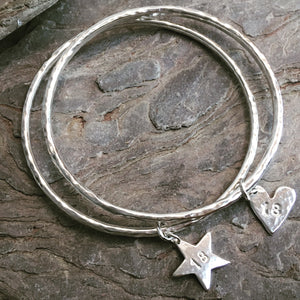 Silver bracelet with personalised heart or star.