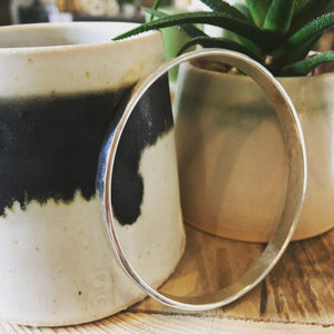 Hammered Flat silver bangle.