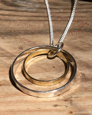 Double silver and gold circles necklace.