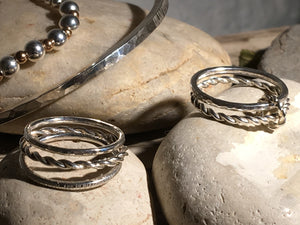 Multi textured triple stacking ring.