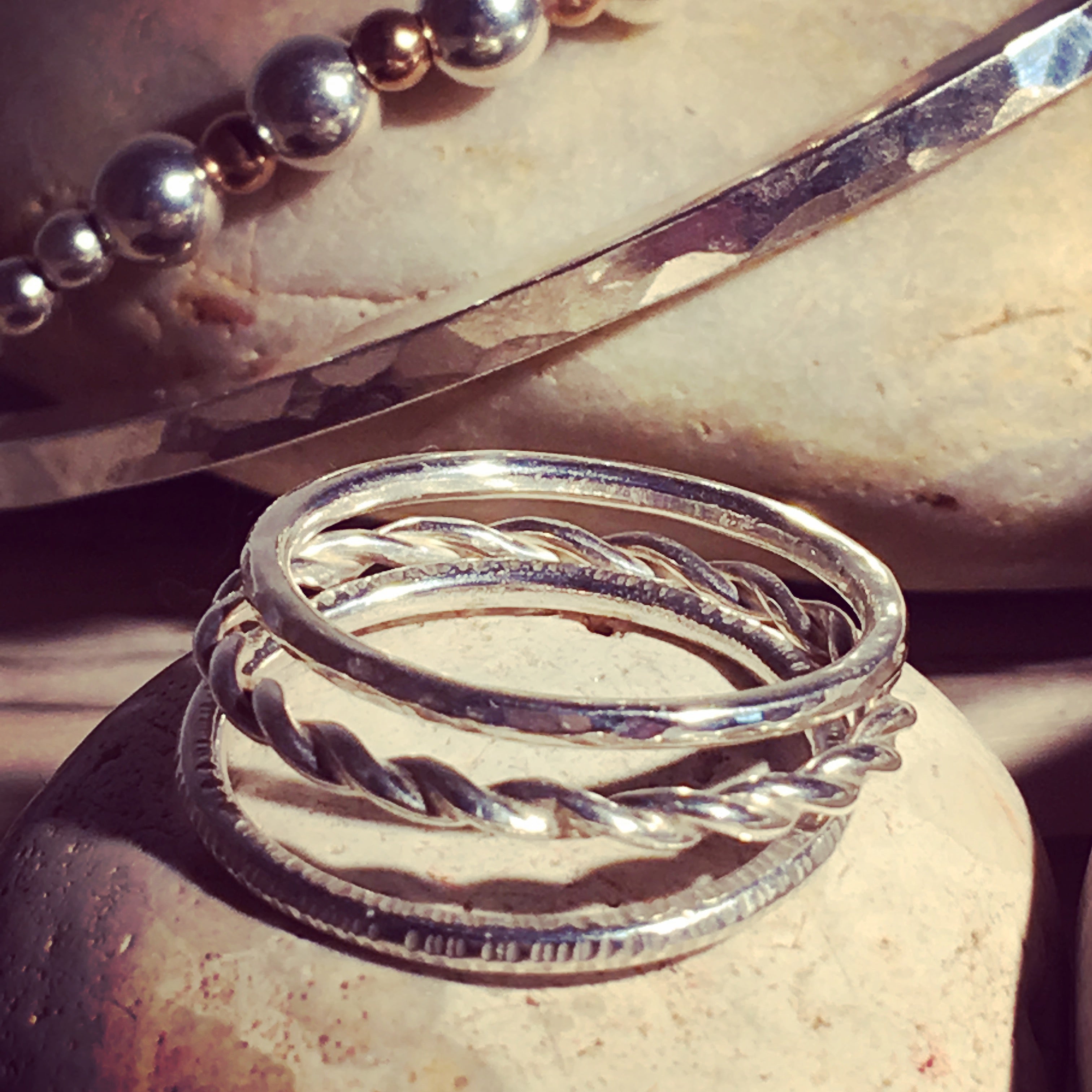 Multi textured triple stacking ring.