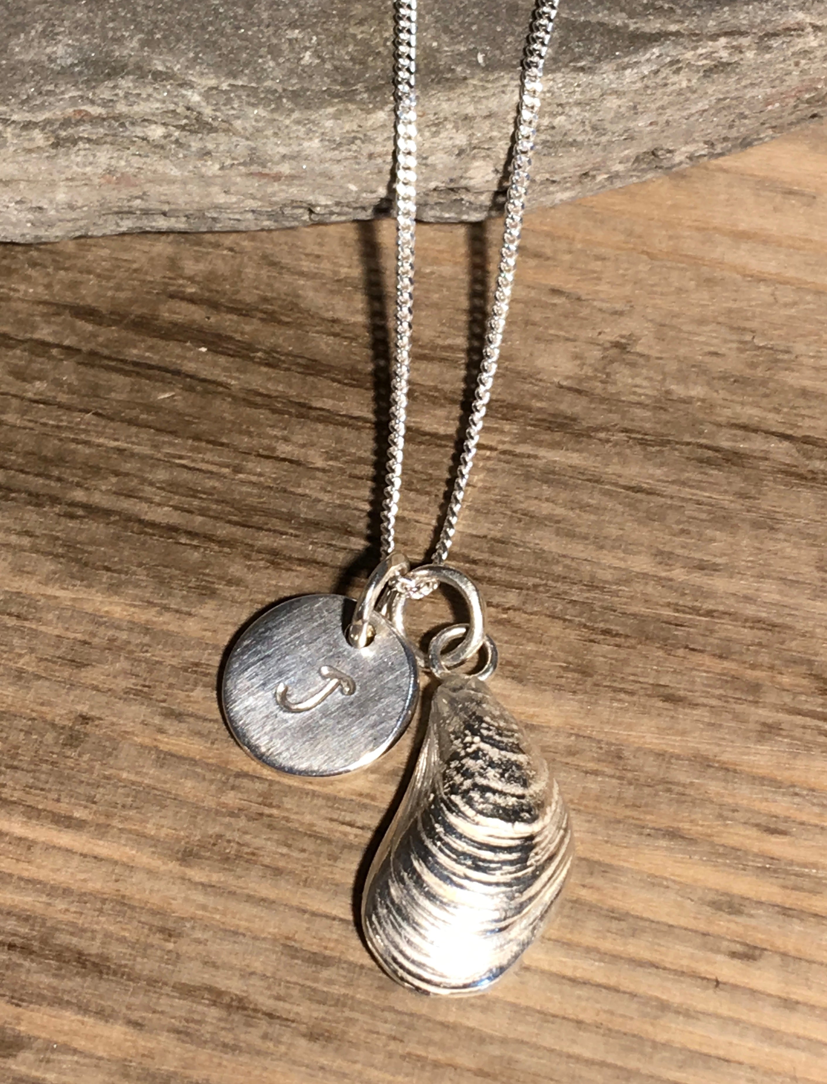 Silver Mussel Shell necklace.
