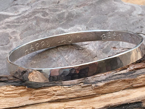 Silver Flat textured bangle with personalised inside.
