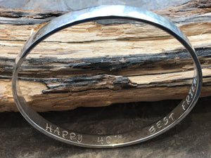 Silver Flat textured bangle with personalised inside.