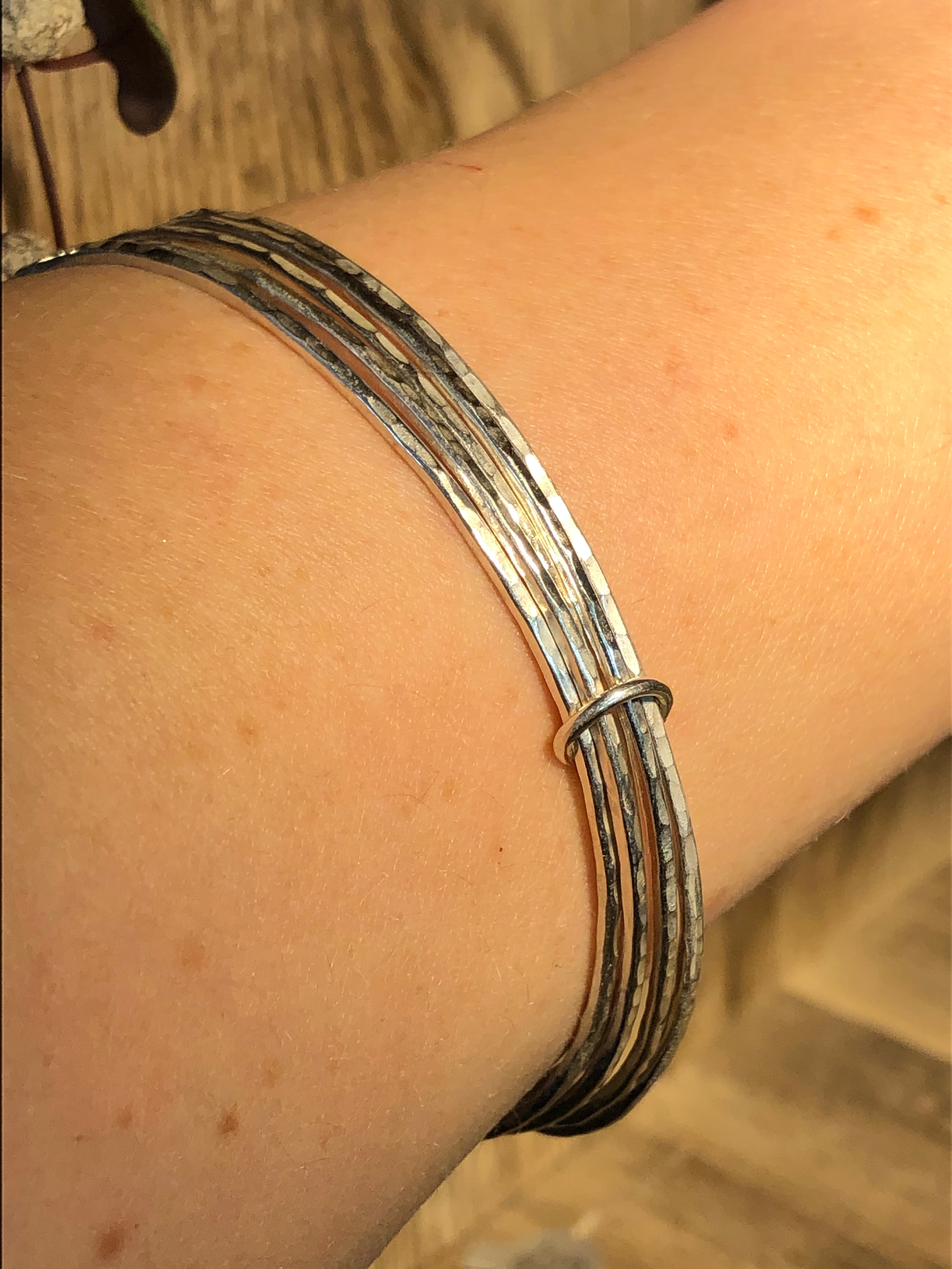 Silver stacking bracelet.