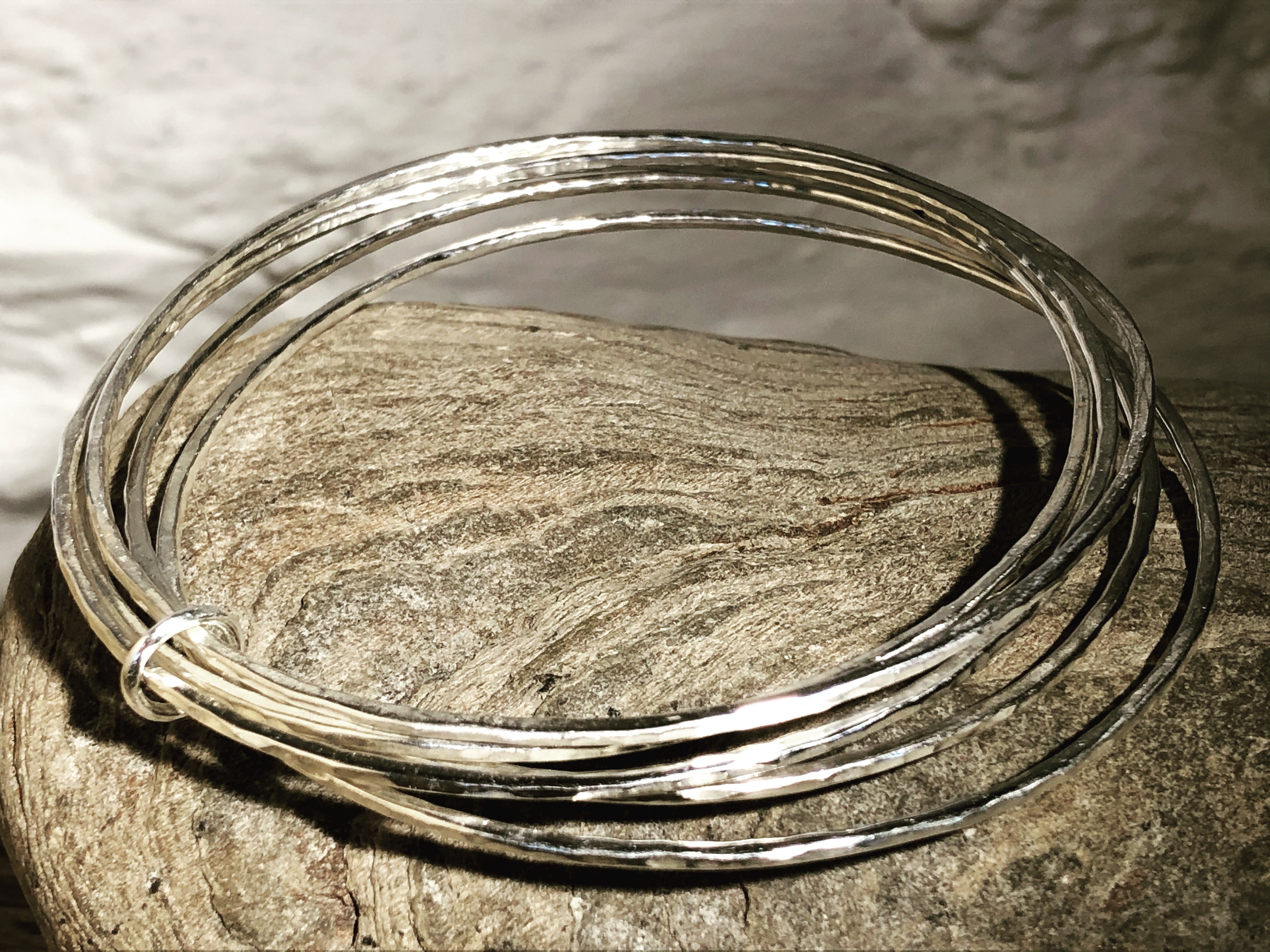Silver stacking bracelet.