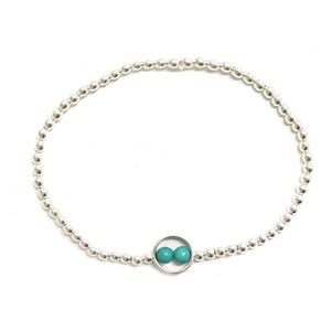 Silver bead bracelet with double aqua bead