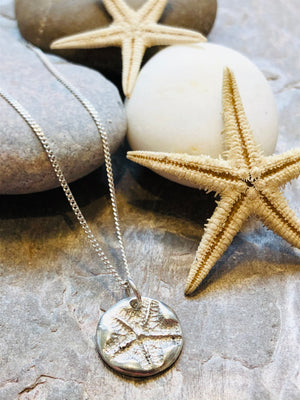Starfish necklace.